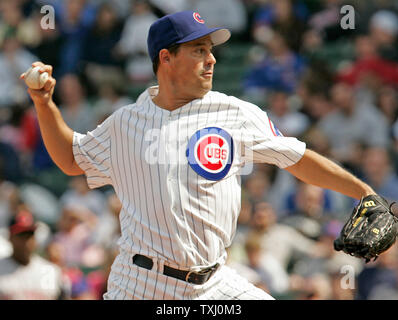 Photo: Former Chicago Cubs Pitchers Greg Maddux and Ferguson Jenkens Number  Retired in Chicago - CHI2009050308 