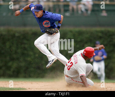 CHICAGO, IL - AUGUST 23: Chicago Cubs second basemen Zach McKinstry (6)  hits a single in the third inning during game 1 of a doubleheader between  the St. Louis Cardinals and Chicago