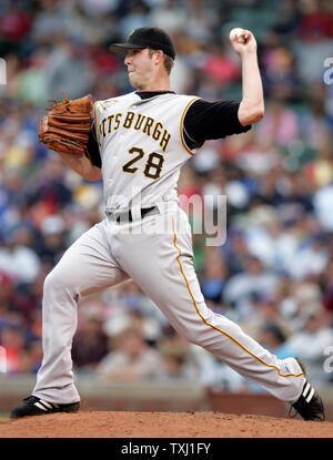 Pittsburgh Pirates starting pitcher Paul Maholm throws to the Houston ...