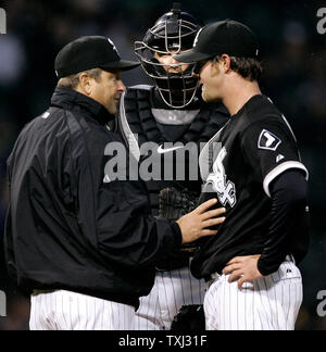 Chicago White Sox pitching coach Don Cooper walks to the dugout after a ...