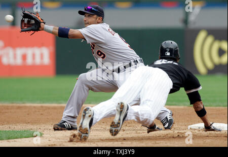 Detroit Tigers shortstop Carlos Guillen avoids New York Yankees