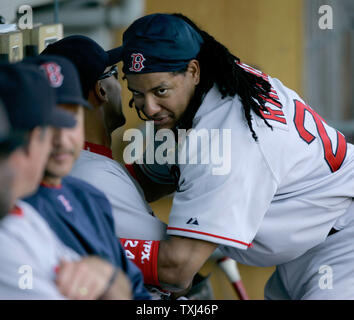 Boston Red Sox's Manny Ramirez (R) goofs around in the dugout as his team plays the Chicago White Sox in Chicago on August 25, 2007. (UPI Photo/Brian Kersey) Stock Photo