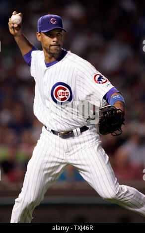 Chicago Cubs' Derrek Lee walks in the infield after grounding out in the  first inning of a baseball game against the Milwaukee Brewers Monday, June  26, 2006 in Chicago. Lee played his