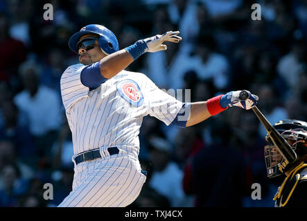 Pittsburgh Pirates' Derrek Lee hits an RBI single against the Chicago Cubs  during the first inning of a baseball game on Saturday, Sept. 3, 2011, in  Chicago. (AP Photo/Nam Y. Huh Stock