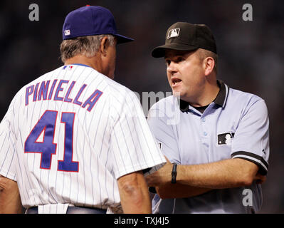 Chicago Cubs manager Lou Piniella reacts after umpire's call on a double  play that ended the Cubs second inning against the Colorado Rockies at  Coors Field in Denver on August 9, 2009.