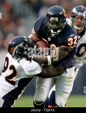 Denver Broncos' Elvis Dumervil (92) kneels on the ground after the ...