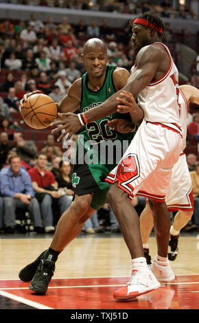Boston Celtics guard Ray Allen (20) drives to the basket against Chicago Bulls center Ben Wallace during the fourth quarter at the United Center in Chicago on December 8, 2007. The Celtics defeated the Bulls 92-81. (UPI Photo/Mark Cowan) Stock Photo