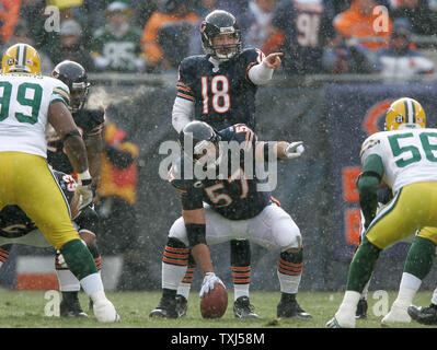 Chicago Bears quarterback Kyle Orton (18) and center Olin Kreutz call out the defense against the Green Bay Packers during the first quarter at Soldier Field in Chicago on December 23, 2007. The Bears won 35-7.  (UPI Photo/Brian Kersey) Stock Photo