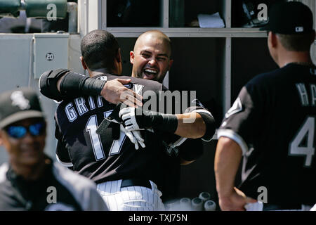 Chicago White Sox's Nick Swisher follows through on a solo homer during the  fourth inning against