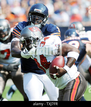 Chicago Bears defensive linemen Alex Brown (96) and Mark Anderson (97)  celebrate after Brown sacked Buffalo Bills quarterback J.P. Losman for an  8-yard loss during the first quarter at Soldier Field in