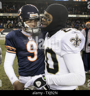 New Orleans Saints cornerback Randall Gay (20) congratulates Chicago Bears kicker Robbie Gould (9) after the game at Soldier Field on December 11, 2008. The Bears won 27-24 on Gould's field goal in overtime. (UPI Photo/Brian Kersey) Stock Photo