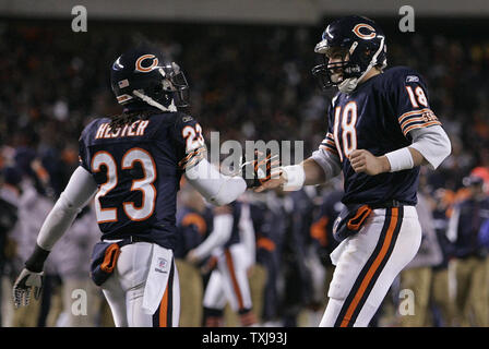 Chicago Bears quarterback Kyle Orton high-fives receiver Devin Hester during overtime against the New Orleans Saints at Soldier Field on December 11, 2008. The Bears won 27-24 in overtime. (UPI Photo/Brian Kersey) Stock Photo