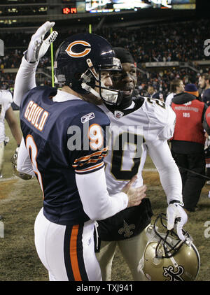 New Orleans Saints cornerback Randall Gay (20) congratulates Chicago Bears kicker Robbie Gould (9) after the game at Soldier Field on December 11, 2008. The Bears won 27-24 on Gould's field goal in overtime. (UPI Photo/Brian Kersey) Stock Photo