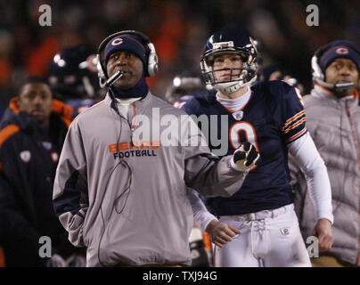 Chicago Bears head coach Lovie Smith and kicker Robbie Gould watch the game against the New Orleans Saints during the fourth quarter at Soldier Field on December 11, 2008. The Bears won 27-24 in overtime. (UPI Photo/Brian Kersey) Stock Photo