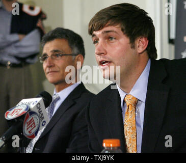 Chicago Bears new quarterback Jay Cutler (L) and general manager Jerry Angelo speak during a news conference at Halas Hall in Lake Forest, Illinois on April 3, 2009. The Bears traded quarterback Kyle Orton, two first round draft picks and a third round draft pick Thursday to the Denver Broncos to acquire Cutler. (UPI Photo/Brian Kersey) Stock Photo