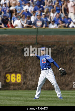 Chicago Cubs center fielder Kosuke Fukudome of Japan warms up during the eighth inning against the Florida Marlins at Wrigley Field in Chicago on May 3, 2009. The Cubs won 6-4. (UPI Photo/Brian Kersey) Stock Photo