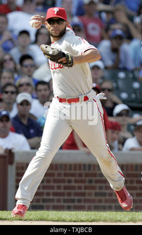 Philadelphia Phillies third baseman Pedro Feliz throws out Chicago Cubs catcher Geovany Soto in the ninth inning at Wrigley Field in Chicago on August 13, 2009. UPI /Mark Cowan Stock Photo