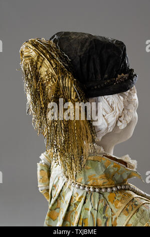 Mannequin wearing paper hat by Isabelle de Borchgrave Stock Photo