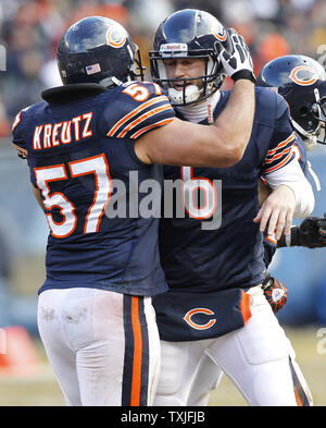 Chicago Bears quarterback Jay Cutler (6) celebrates his 3-yard touchdown run against the New York Jets with center Olin Kreutz (57) during the second quarter at Soldier Field in Chicago on December 26, 2010.  UPI /Mark Cowan Stock Photo