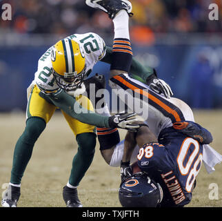 Green Bay Packers cornerback Charles Woodson breaks up a pass intended for  Pittsburgh Steelers wide receiver Mike Wallace in the second quarter during  Super Bowl XLV at Cowboys Stadium in Arlington, Texas