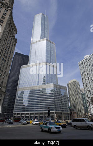 Cars drive on Wacker Drive past the Trump International Hotel and Tower on March 31, 2011 in Chicago. The Trump Tower opened in 2008 as a mixed hotel-residential and is the second-tallest building in the United States.     UPI/Brian Kersey Stock Photo