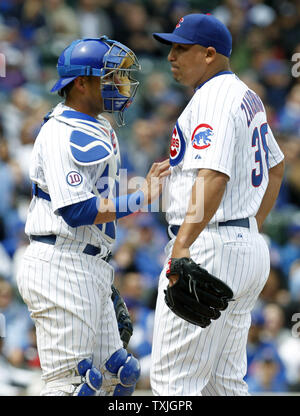 Chicago Cubs catcher Geovany Soto, left, talks with starting pitcher Carlos Zambrano, right, after giving up 5 runs in the first inning to the Los Angeles Dodgers at Wrigley Field in Chicago on April 24, 2011.  UPI /Mark Cowan Stock Photo