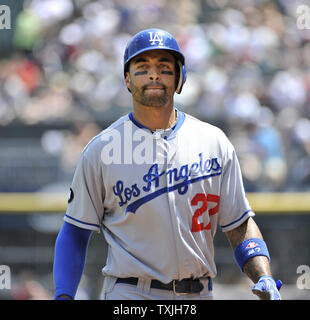 Los Angeles Dodgers center fielder Matt Kemp puts pine tar on his bat prior  to their baseball game against the San Diego Padres, Monday, April 15, 2013,  in Los Angeles. (AP Photo/Mark