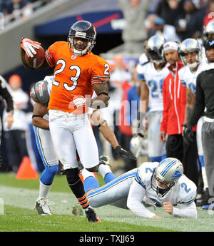 Chicago Bears kick returner Devin Hester (23) breaks Minnesota Vikings  Heath Farwell's (59) tackle on his way to an 89-yard punt return for a  touchdown during the first quarter at Soldier Field