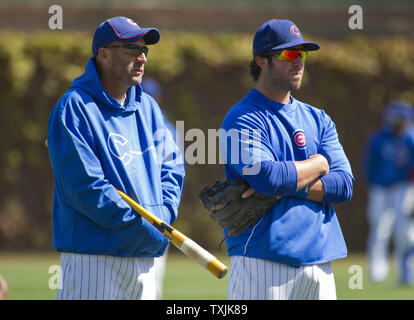 Chicago Cubs manager Dale Sveum (L) talks with Ian Stewart before their opening day game against the Washington Nationals on April 4, 2012 in Chicago.     UPI/Brian Kersey Stock Photo