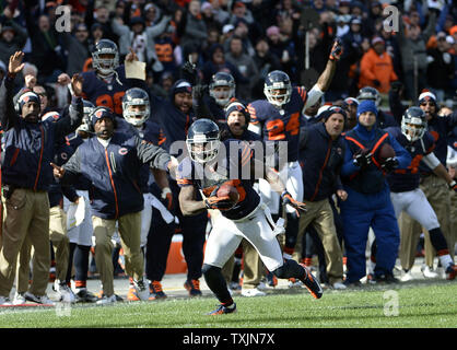 The Chicago Bears sideline erupts as cornerback Tim Jennings returns an  interception 25-yards for a touchdown during the fourth quarter against the  Carolina Panthers at Soldier Field on October 28, 2012 in Chicago. The  Bears won 23-22. UPI/Brian