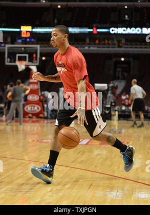 Chicago Bulls guard Derrick Rose takes some shots during the warm up before the game against the San Antonio Spurs at the United Center in Chicago on February 11, 2013. Rose, who had ACL surgery in the off-season is expected to return to the lineup in late February or early March.     UPI/Brian Kersey Stock Photo