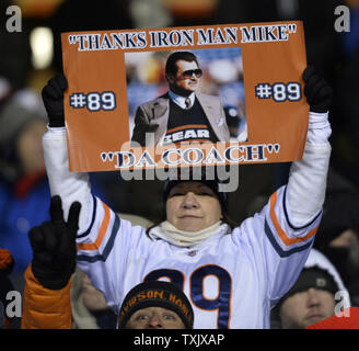 A Chicago Bears fan holds up a sign for former Chicago Bears tight end and  head coach Mike Ditka during the first quarter of the game against the  Dallas Cowboys at Soldier