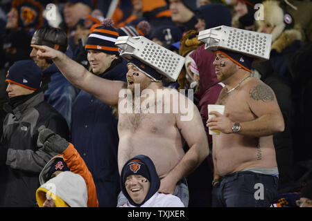 Chicago Bears fans cheer as their team play the Minnesota Vikings at  Soldier Field on November 25, 2012 in Chicago. The Bears won 28-10.  UPI/Brian Kersey Stock Photo - Alamy