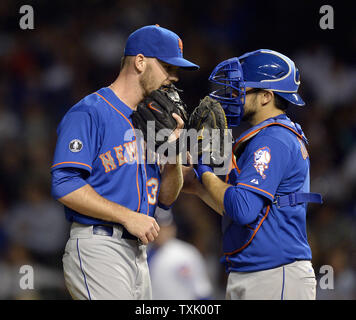 New York Mets pitcher Vic Black wears a patch on his uniform in honor of  broadcaster Ralph Kiner during spring training baseball practice Monday,  Feb. 17, 2014, in Port St. Lucie, Fla.