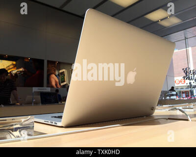 A MacBook Pro computer is displayed at the Apple store on September 9, 2014 in Chicago. Apple announced new products Tuesday including the iPhone 6, Apple Pay and the Apple Watch during a press event at their headquarters in Cupertino, California.     UPI/Brian Kersey Stock Photo