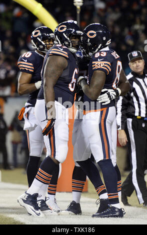 Green Bay Packers defensive tackle Jordan Miller (L) sacks Chicago Bears  quarterback Jay Cutler for a 5-yard loss during the third quarter at  Soldier Field on December 16, 2012 in Chicago. The