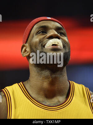 LeBron James tosses the football before the beginning of the game as the Dallas  Cowboys faced the Washington Redskins at FedEx Field in Landover, Maryland,  Sunday, September 12, 2010. (Photo by Ron