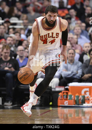Chicago Bulls forward Nikola Mirotic takes the ball up the floor during the second quarter against the Atlanta Hawks at the United Center in Chicago on April 15, 2015. The Bulls defeated the Hawks 91-85.    Photo by Brian Kersey/UPI Stock Photo