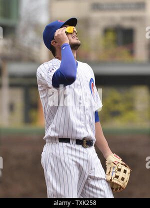 Chicago Cubs' Kris Bryant stands on the field during batting practice ...