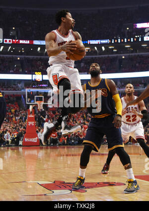 Chicago Bulls guard Derrick Rose (L) drives on Cleveland Cavaliers guard Kyrie Irving (2) during the first quarter of game 4 of the Eastern Conference Semifinals of the NBA Playoffs at the United Center on May 10, 2015 in Chicago.    Photo by David Banks/UPI Stock Photo