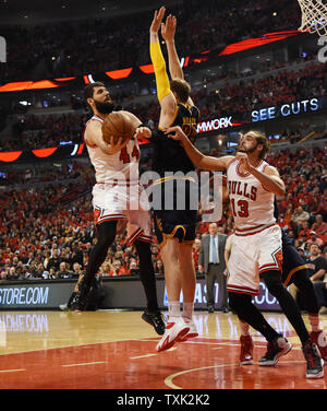 Chicago Bulls forward Nikola Mirotic (44) drives on Cleveland Cavaliers center Timofey Mozgov (20) during the first half of game 4 of the Eastern Conference Semifinals of the NBA Playoffs at the United Center on May 10, 2015 in Chicago.   Photo by David Banks/UPI Stock Photo
