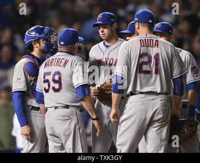 New York Mets starters (L-R) Matt Harvey, Noah Syndergaard, and Jacob deGrom  talk in the bullpen prior to plaing the Chicago Cubs in game 4 of the  National League Championship Series at