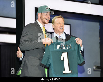 North Dakota State quarterback Carson Wentz poses with NFL Commissioner Roger Goodell after being selected by the Philadelphia Eagles with the second overall pick in the 2016 NFL Draft on April 28, 2016 in Chicago.     Photo by Brian Kersey/UPI Stock Photo