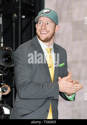 North Dakota State quarterback Carson Wentz walks onto the stage after being selected by the Philadelphia Eagles with the second overall pick in the 2016 NFL Draft on April 28, 2016 in Chicago.     Photo by Brian Kersey/UPI Stock Photo