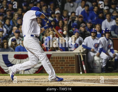 Chicago Cubs' Ben Zobrist hits RBI single off of San Francisco Giants' Jeff Samardzija during the first inning of the game 2 of the National League Division Series at Wrigley Field in Chicago on October 8, 2016. Photo by Kamil Krzaczynski/UPI Stock Photo