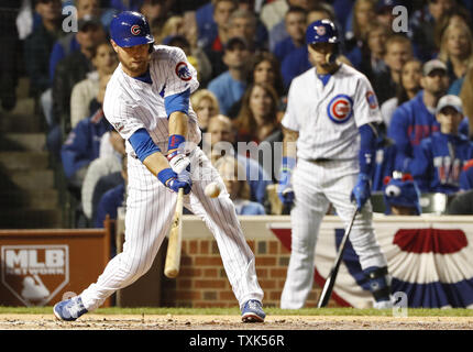 Chicago Cubs' Ben Zobrist hits a sacrifice fly in the first inning during game 6 of the National League Championship Series at Wrigley Field in Chicago, on October 22, 2016. Photo by Kamil Krzaczynski/UPI Stock Photo