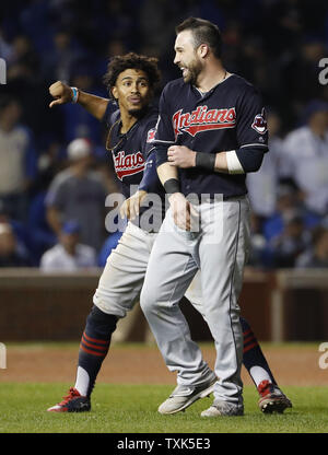 https://l450v.alamy.com/450v/txk5e3/cleveland-indians-shortstop-francisco-lindor-l-and-second-baseman-jason-kipnis-r-smile-before-the-bottom-half-of-the-ninth-inning-in-game-4-of-the-world-series-at-wrigley-field-in-chicago-october-29-2016-kipnis-hit-a-3-rbi-home-run-and-powered-the-indians-to-a-7-2-win-and-a-3-1-series-lead-photo-by-kamil-krzaczynskiupi-txk5e3.jpg