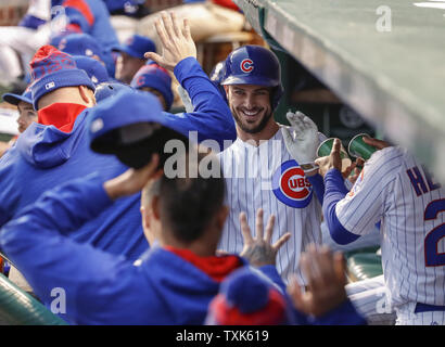 Chicago Cubs Kris Bryant celebrates with teammates after hitting a solo home off Philadelphia Phillies starting pitcher Jeremy Hellickson during the first inning at Wrigley Field on May 2, 2017 in Chicago. Photo by Kamil Krzaczynski/UPI Stock Photo