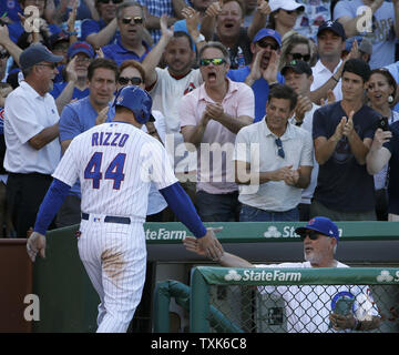 Chicago Cubs' Anthony Rizzo (L) celebrates with Kris Bryant (17) and Javier  Baez (9) celebrates with Addison Russell (R) after defeating the Los  Angeles Dodgers 5-0 in game 6 to win the