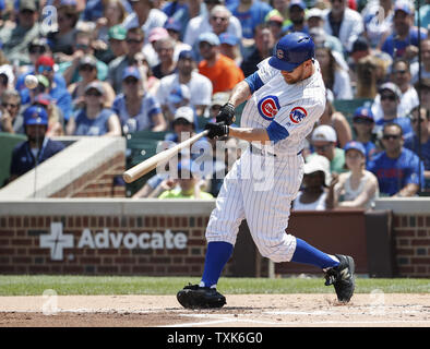 Chicago Cubs Ben Zobrist hits a three-run home run off Colorado Rockies starting pitcher Antonio Senzatela in the first inning at Wrigley Field on June 11, 2017 in Chicago. Photo by Kamil Krzaczynski/UPI Stock Photo